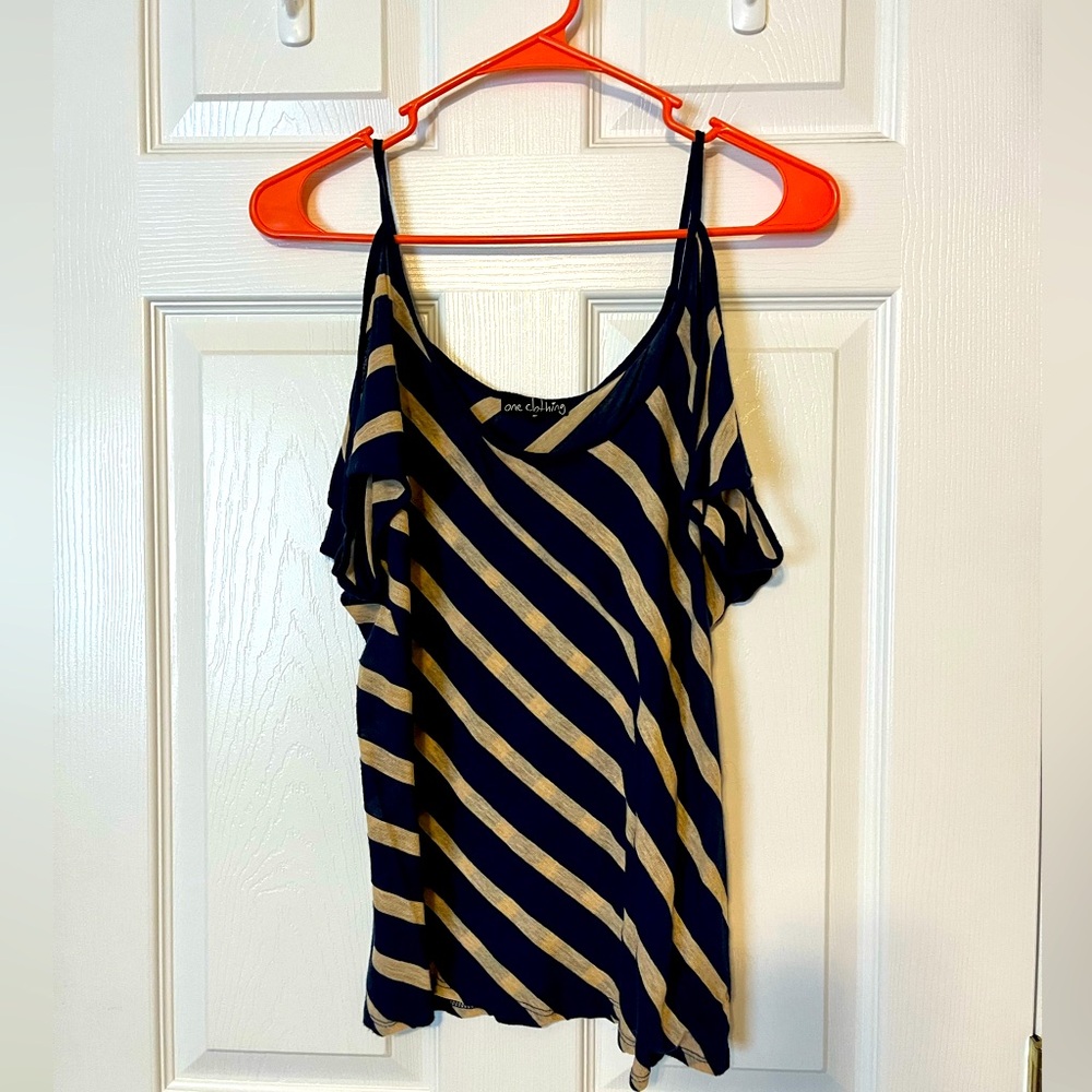 Navy and gold hang off shoulder shirt.